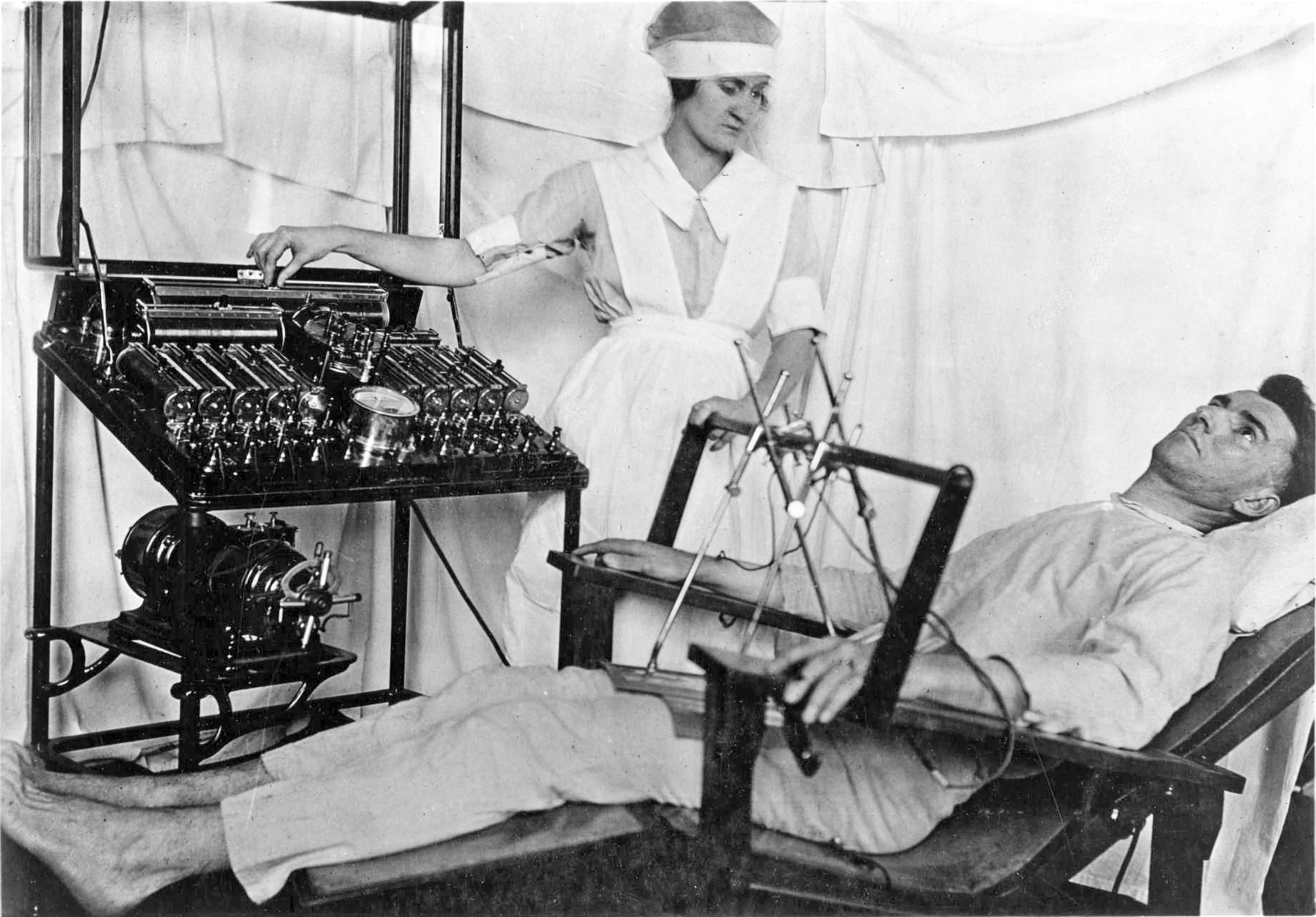 Use of Bergonic chair for giving electro convulsive treatment for psychological effect, in psycho-neurotic cases. World War 1 era. 